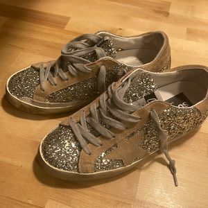 Worn once golden goose woman’s sz 6 excellent condition with shoe bag no box ..